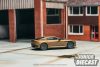 (Előrendelés) Tarmac Works ASTON MARTIN DBS SUPERLEGGERA BROWN METALLIC 2025